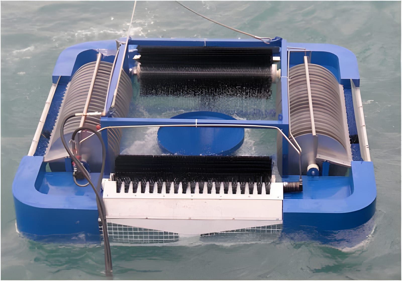 Oil skimmer deployed at sea during a spill response operation
