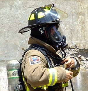 Technician wearing a self-contained breathing apparatus